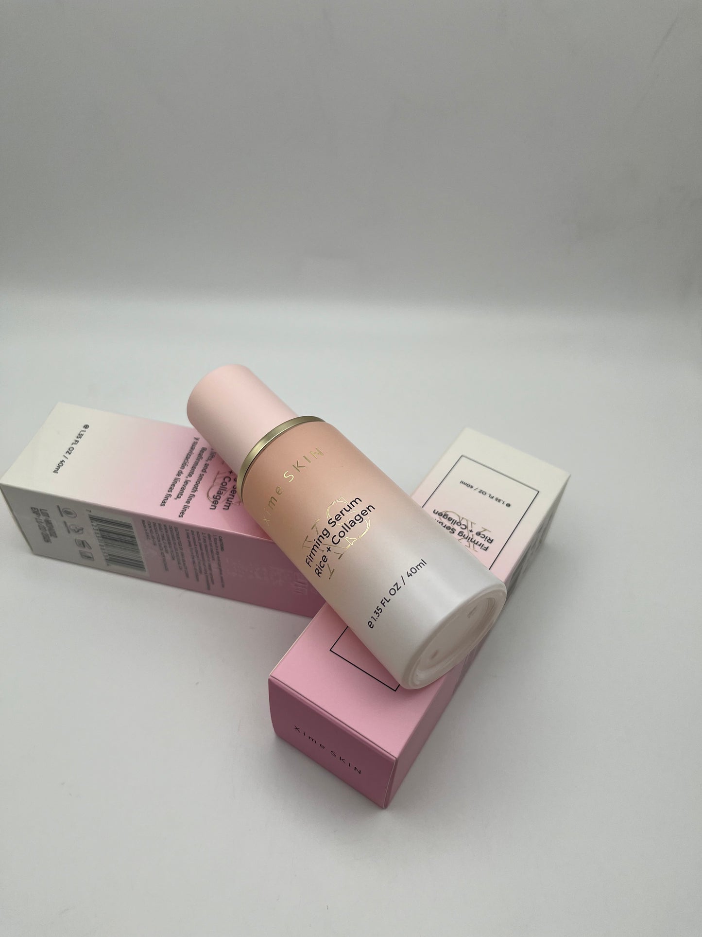 XIME SKIN FIRMING SERUM RICE + COLLAGEN FIRMS, LIFTS,  AND SMOOTH FINE LINES.  REAFIRMANTE, LEVANTA, Y SUAVIZACION DE LINEAS  FINAS.    e 1.35 FL OZ / 40ML