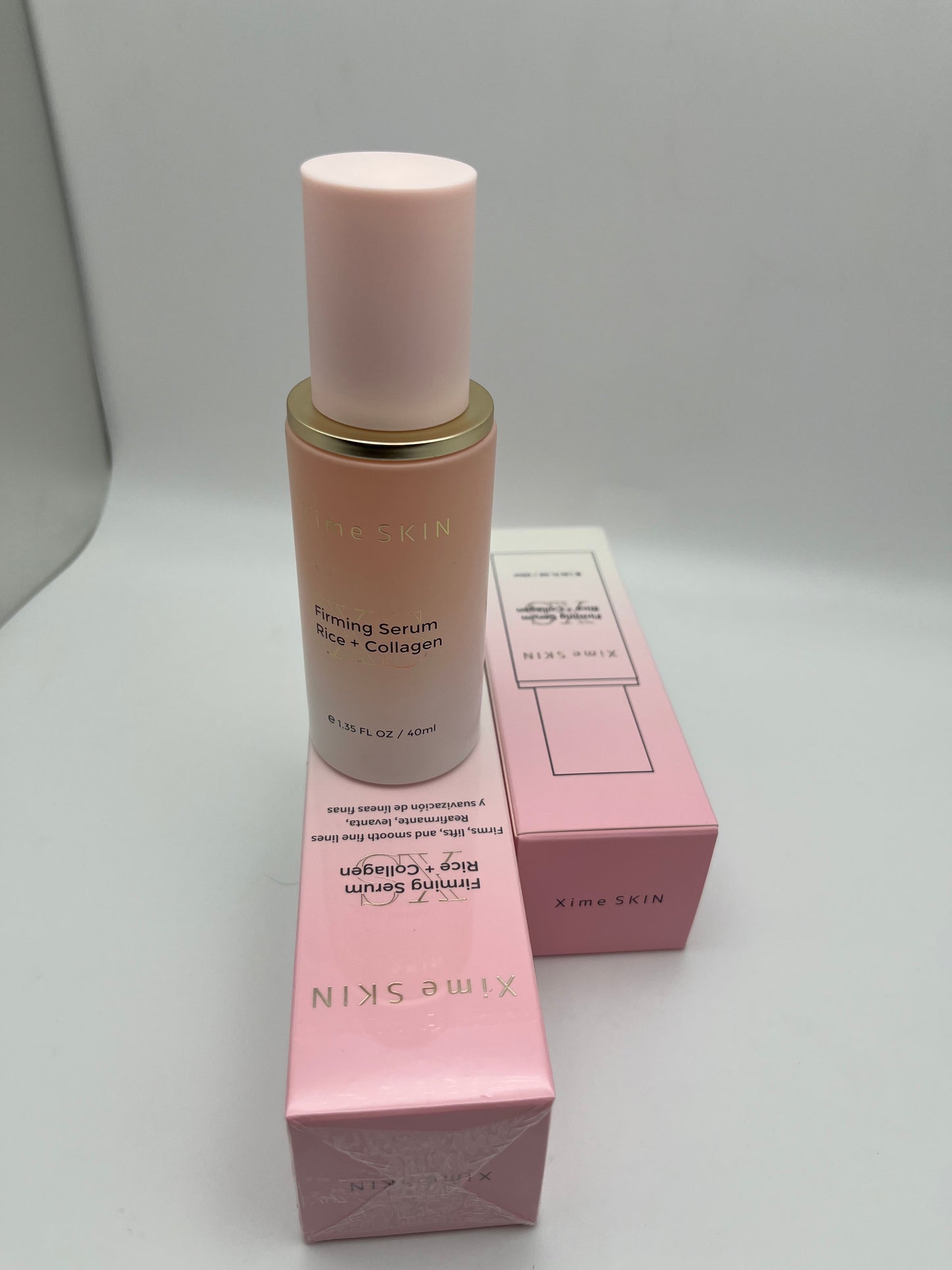 XIME SKIN FIRMING SERUM RICE + COLLAGEN FIRMS, LIFTS,  AND SMOOTH FINE LINES.  REAFIRMANTE, LEVANTA, Y SUAVIZACION DE LINEAS  FINAS.    e 1.35 FL OZ / 40ML