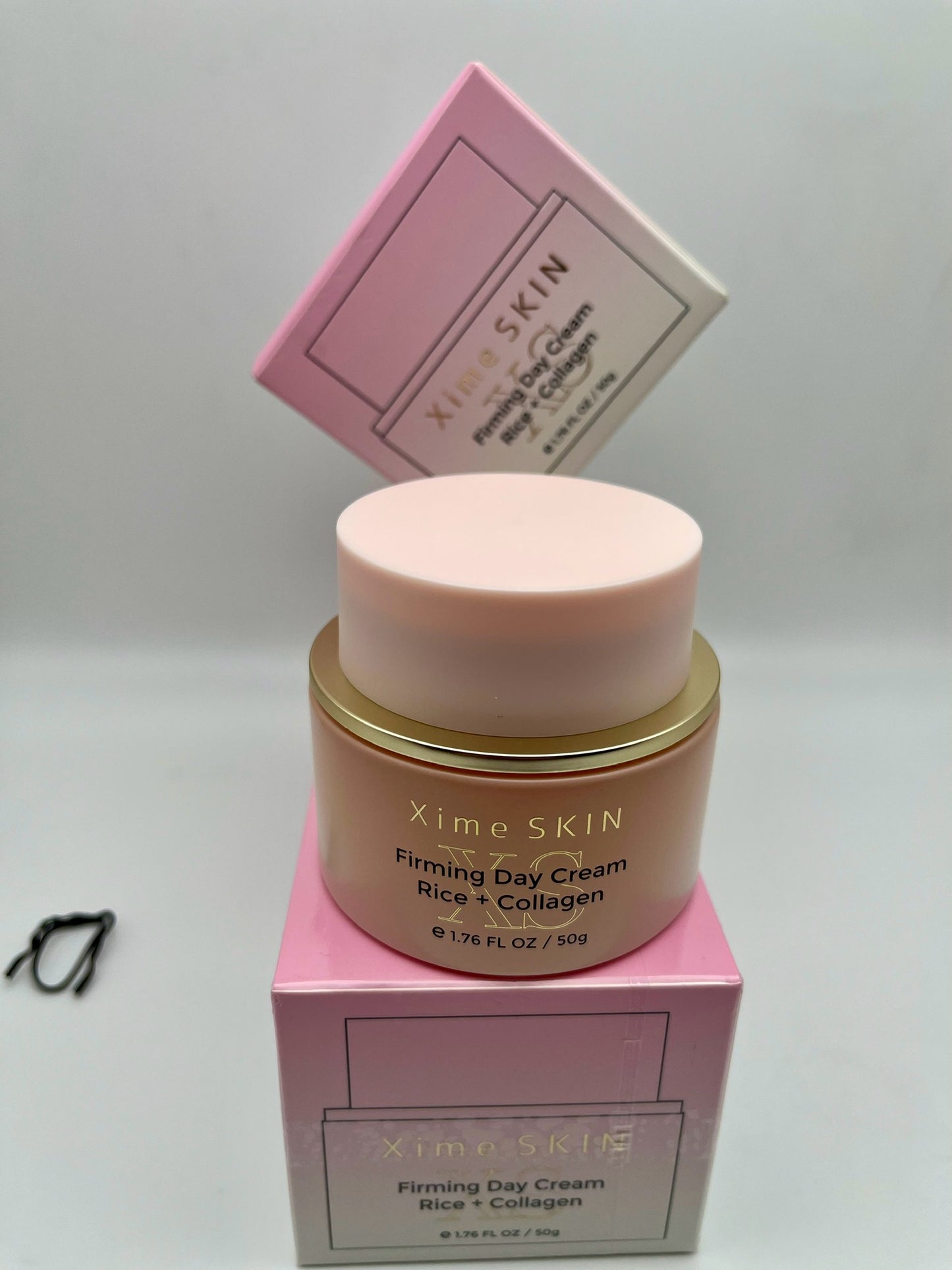 XIME SKIN  FIRMING DAY CREAM RICE + COLLAGEN e 1.76 FL. OZ / 50g INSTANT FIRMING AND LIFTING. GIVES A RENEWED AND SHINING GLOW.